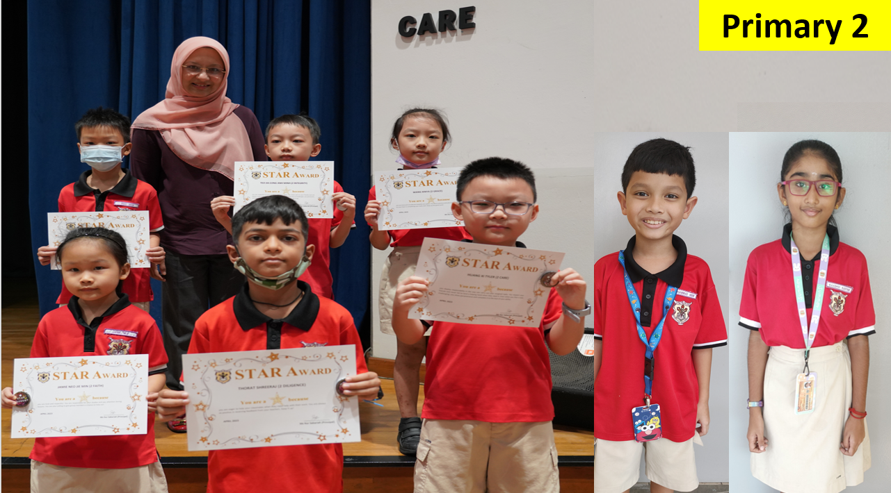 Primary 2 students in red uniforms hold Star Award certificates, standing with a teacher near a wall labeled CARE.
